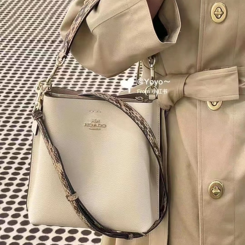 COACH Mollie bucket bag cream with snakeskin pattern handle